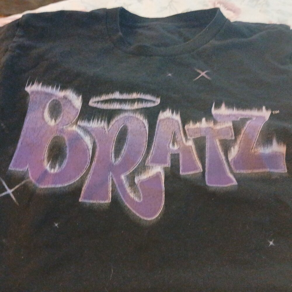 A crop trop Bratz shirt and a Dress